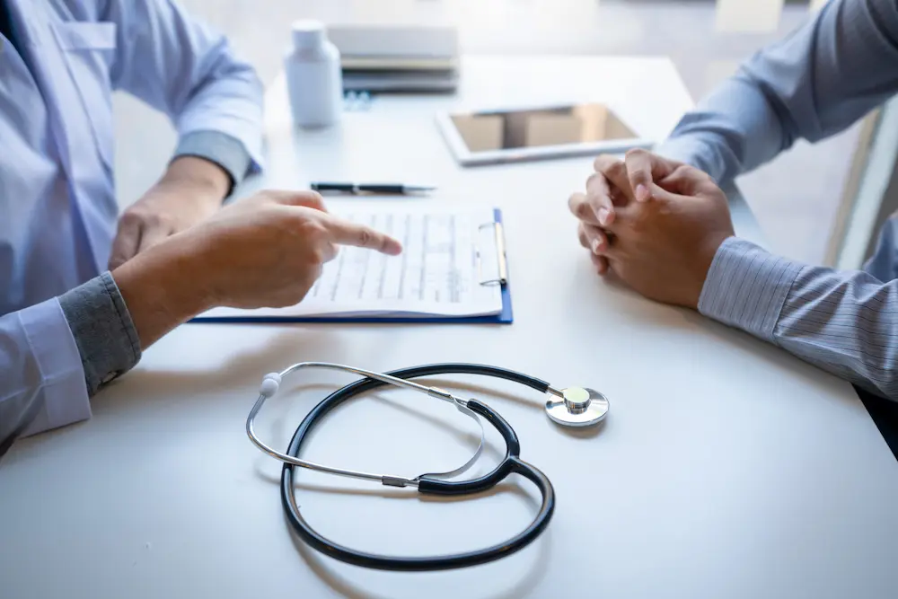 Doctor talking to patient